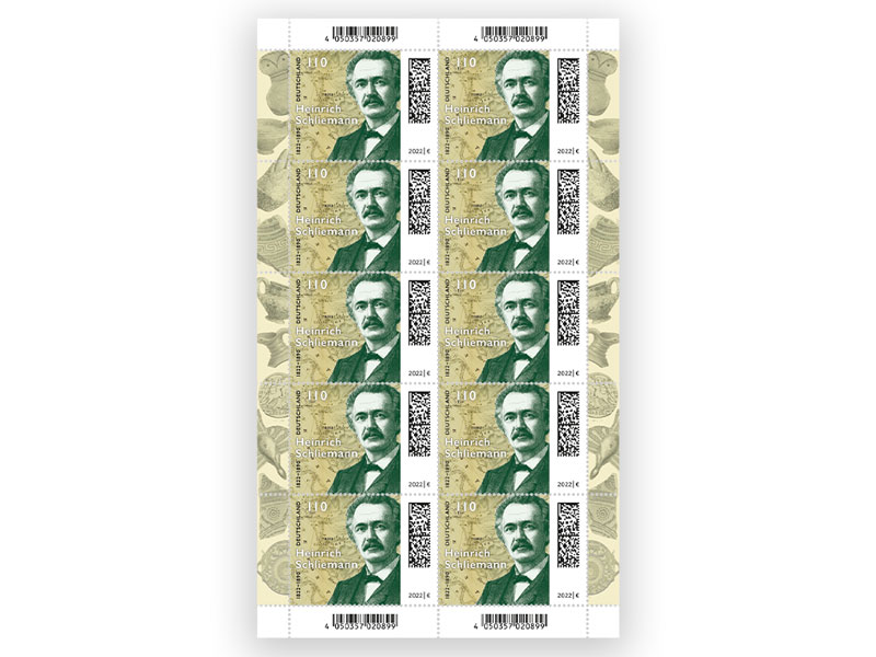 Porträt von Heinrich Schliemann vor historischer Landkarte mit Troja im Fokus