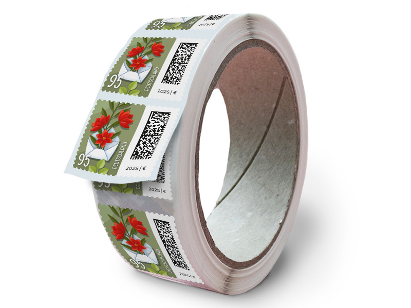 Geöffneter Brief, aus dem Blumen ranken