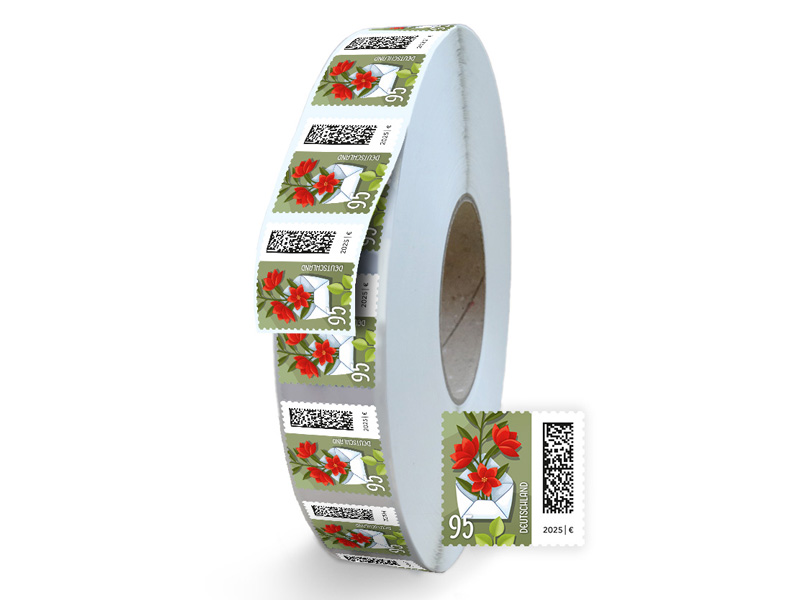 Geöffneter Brief, aus dem Blumen ranken