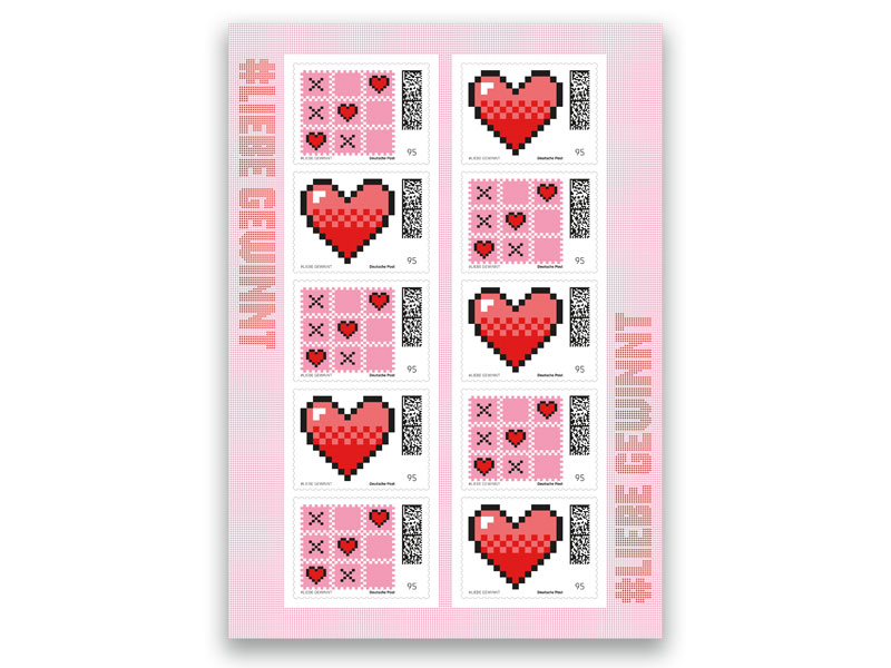 Interaktives Briefmarken-Set im Tic-Tac-Toe-Design mit verspielten Elementen in Rot